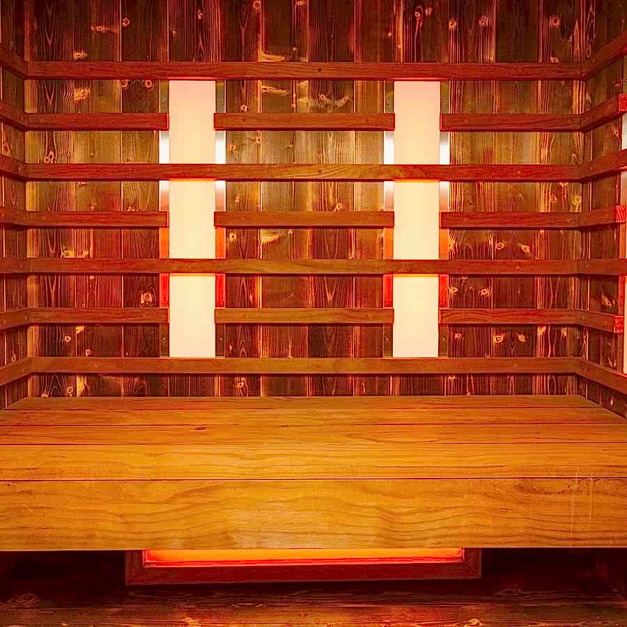 An interior of an empty wooden steam room